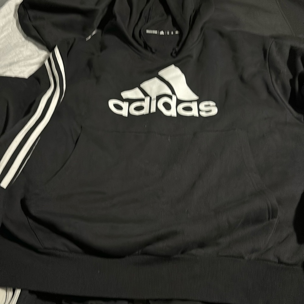 Men’s Adidas size extra large, hooded sweatshirt, brand new